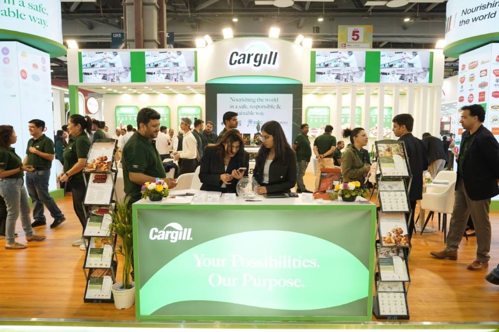 Visitors and Cargill team members interact at the Cargill exhibition booth at AAHAR 2026, showcasing food ingredient innovations.
